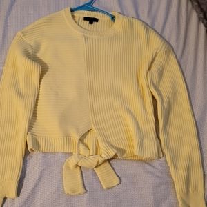 The Range_Spliced tie front cropped sweater